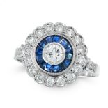 A DIAMOND AND SAPPHIRE DRESS RING of target design, the central round cut diamond within