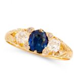 AN ANTIQUE SAPPHIRE AND DIAMOND DRESS RING in high carat yellow gold, set with a cushion cut blue
