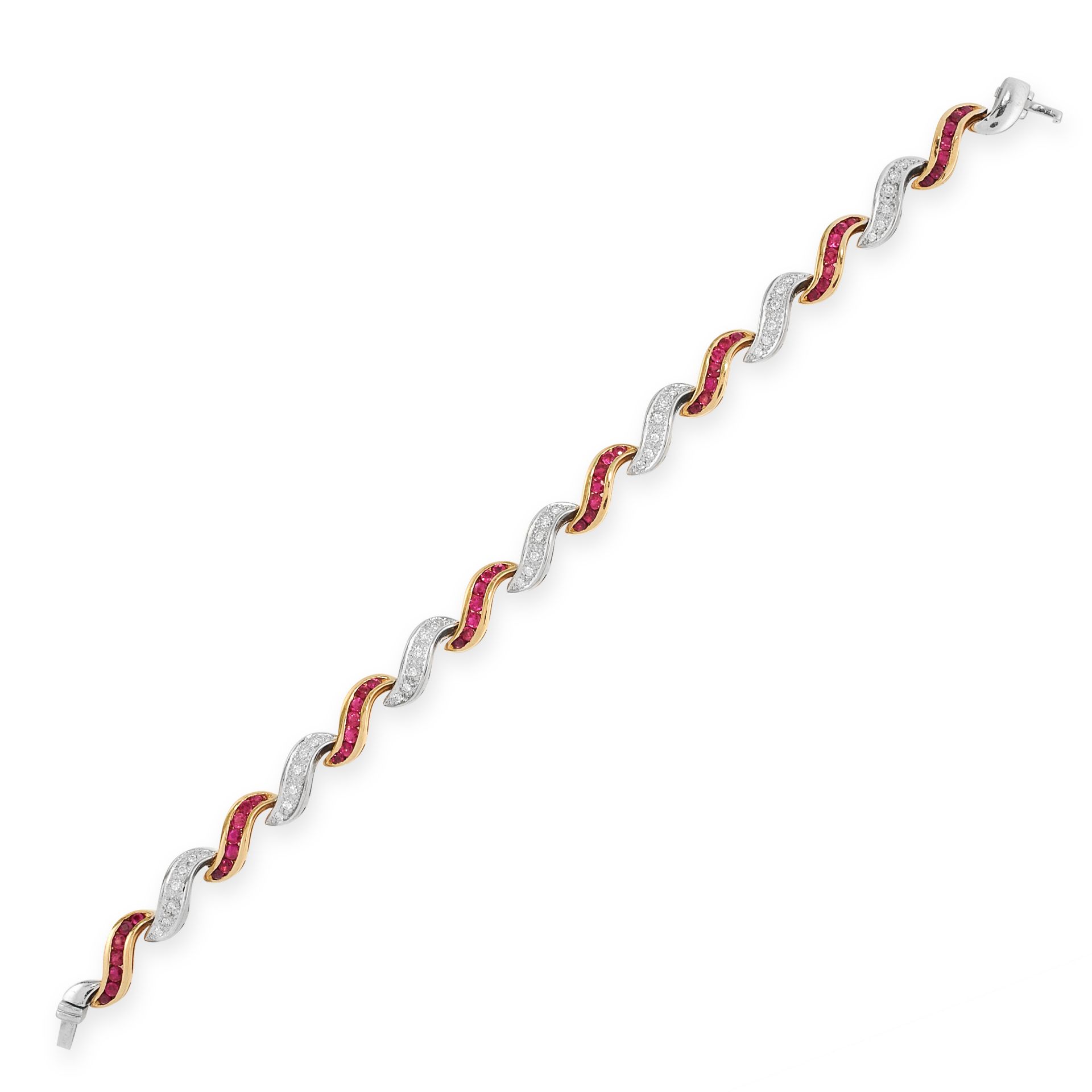 A RUBY AND DIAMOND BRACELET in 18ct yellow and white gold, formed of a series of scroll shaped