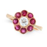 A DIAMOND AND RUBY DRESS RING in high carat yellow gold, set with a central old cut diamond of 0.