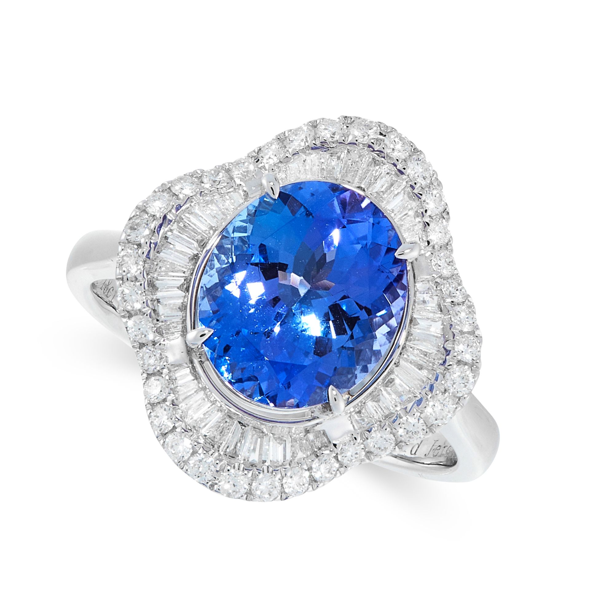 A TANZANITE AND DIAMOND DRESS RING in 18ct white gold, set with an oval cut tanzanite of 3.38