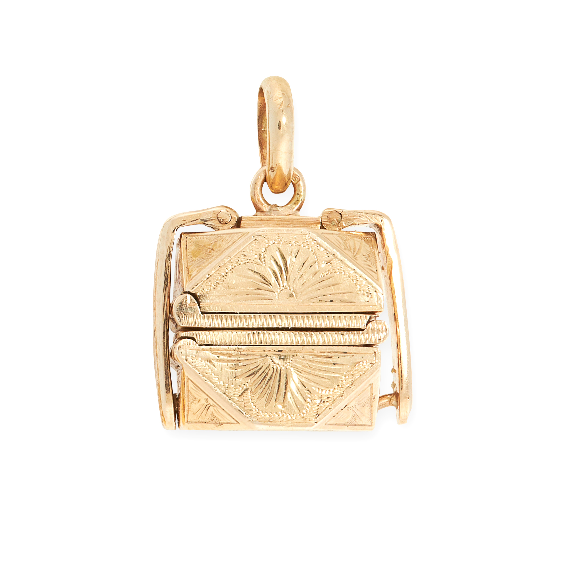 AN ANTIQUE PUZZLE BALL MOURNING LOCKET in yellow gold, the cut cornered square body with engraved