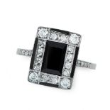 AN ART DECO ONYX AND DIAMOND DRESS RING, EARLY 20TH CENTURY in platinum, set with a step cut black
