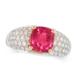AN UNHEATED RUBY AND DIAMOND DRESS RING in 18ct white and yellow gold, set with a cushion cut ruby