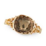 AN ANTIQUE SMOKY QUARTZ / CITRINE DRESS RING, 19TH CENTURY in yellow gold, set with a central