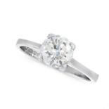 A SOLITAIRE DIAMOND DRESS RING in platinum, set with a round cut diamond of 1.28 carats, full