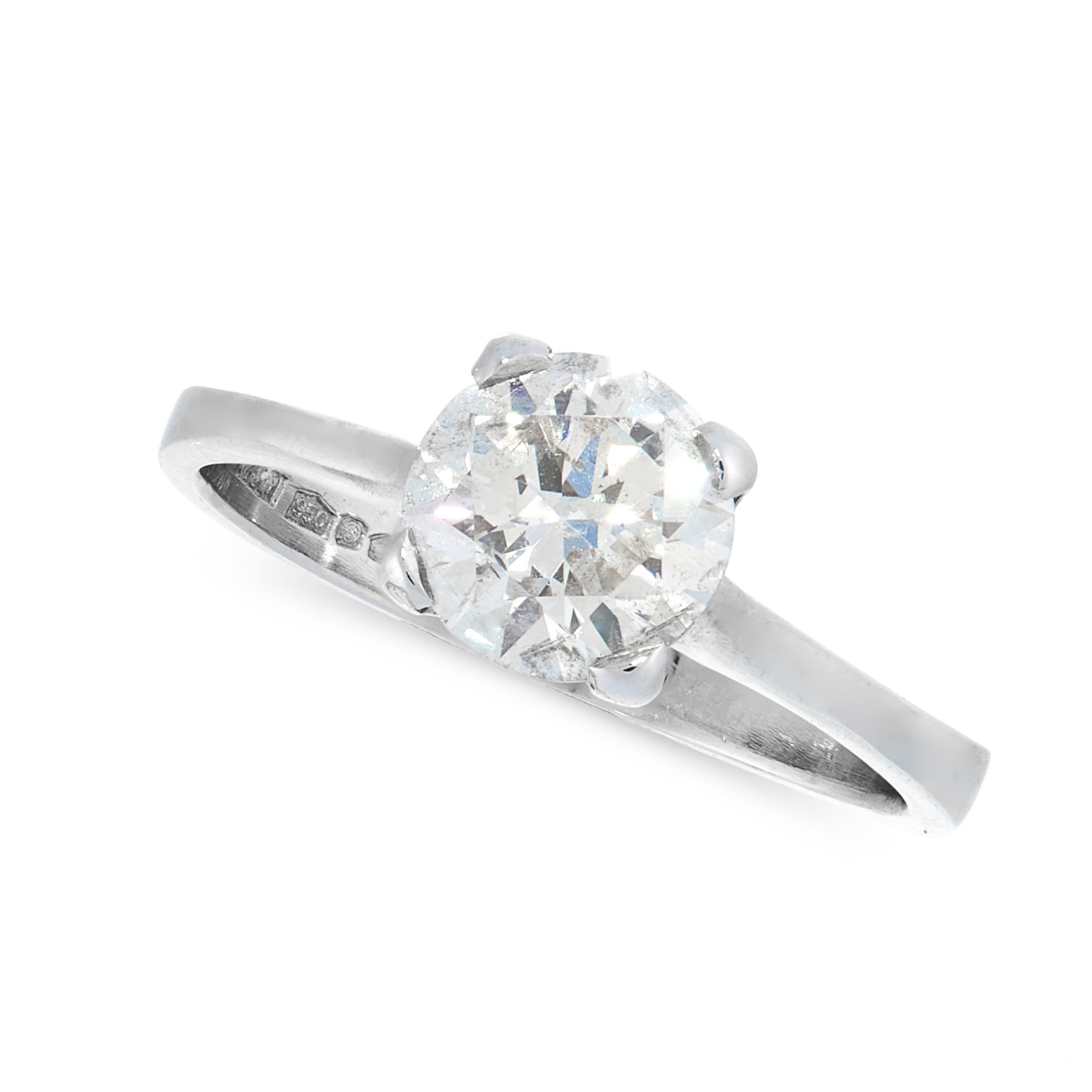 A SOLITAIRE DIAMOND DRESS RING in platinum, set with a round cut diamond of 1.28 carats, full