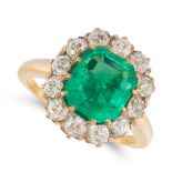 A COLOMBIAN EMERALD AND DIAMOND RING, EARLY 20TH CENTURY in 18ct yellow gold, set with an emerald