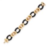 A VINTAGE ONYX AND DIAMOND BRACELET, CIRCA 1970 in 18ct yellow gold, formed of five polished oval