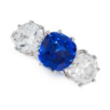 A CEYLON NO HEAT SAPPHIRE AND DIAMOND DRESS RING in 18ct white gold, set with a cushion cut blue