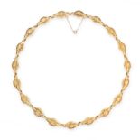 AN ANTIQUE FANCY LINK NECKLACE, 19TH CENTURY in 18ct yellow gold, formed of a series of quatrefoil