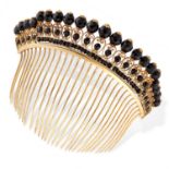 AN ANTIQUE JET HAIRPIECE / TIARA the body designed as a curved hair comb, jewelled with rows of