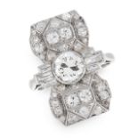 AN ART DECO DIAMOND DRESS RING set with a central old cut diamond of 0.92 carats between trios of