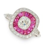 A DIAMOND AND RUBY DRESS RING in platinum, of target design, set with an old cut diamond of 0.58