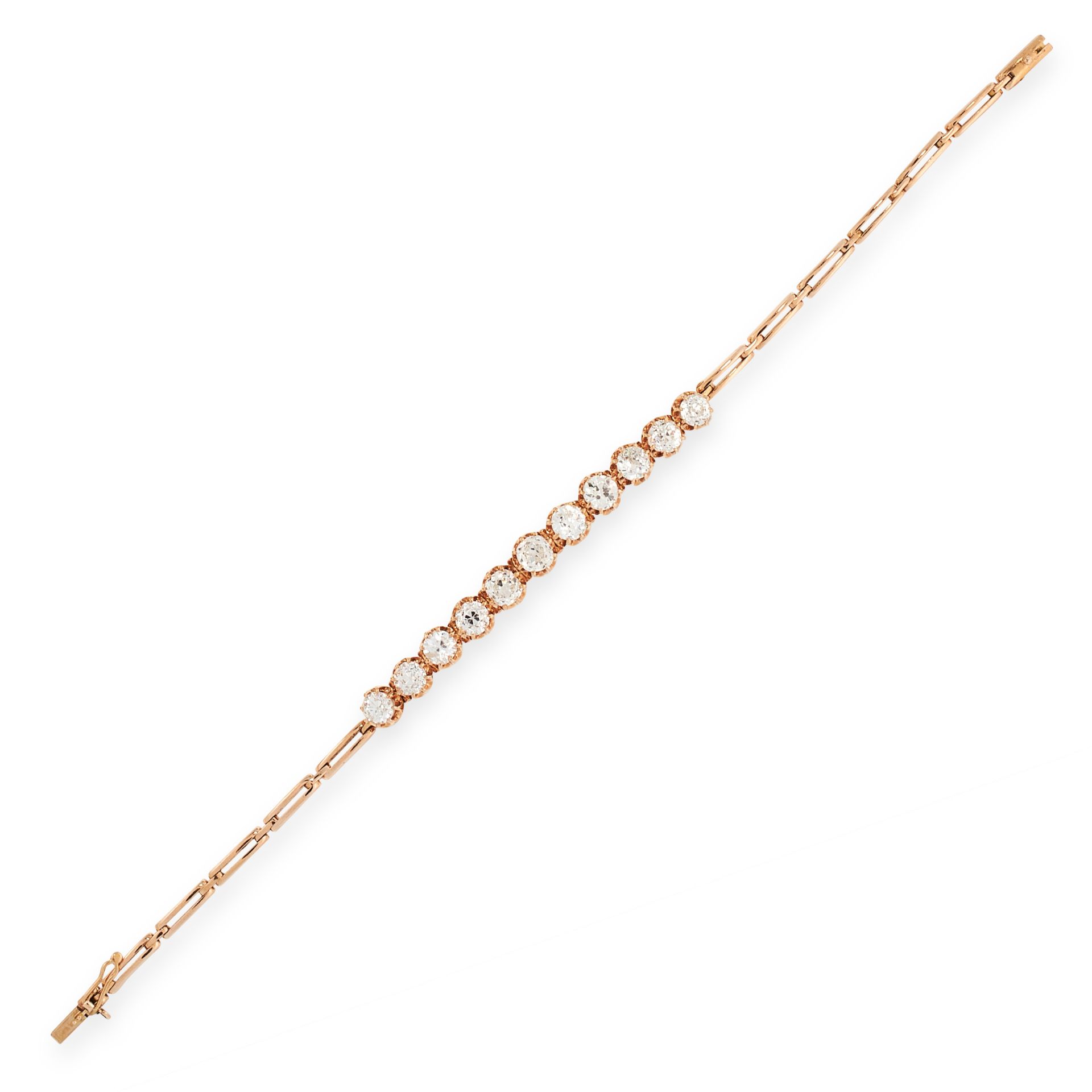 A DIAMOND BRACELET, EARLY 20TH CENTURY in high carat yellow gold, set with a row of eleven graduated