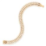 A VINTAGE DIAMOND BRACELET, CARTIER in 18ct yellow gold, comprising three rows of round cut