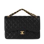A BLACK CAVIAR CLASSIC 2.55 DOUBLE FLAP HAND BAG, CHANEL quilted leather with gold tone hardware,