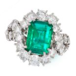 A VINTAGE COLOMBIAN EMERALD AND DIAMOND DRESS RING, REGNER PARIS in platinum, set with an emerald