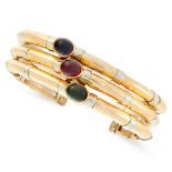 A VINTAGE SAPPHIRE, RUBY AND EMERALD CUFF BANGLE, BULGARI in 18ct yellow gold and white gold,