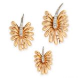 THREE DIAMOND CLIP BROOCHES, CIRCA 1940 in 18ct yellow gold, each designed as a flower, set with a