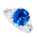 A CEYLON NO HEAT SAPPHIRE AND DIAMOND DRESS RING in platinum, set with a cushion cut blue sapphire