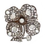AN ANTIQUE DIAMOND BROOCH / PENDANT, 19TH CENTURY in yellow gold and silver, designed as a flower,