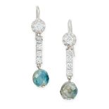 A PAIR OF BLUE DIAMOND AND WHITE DIAMOND EARRINGS in 18ct white gold, each set with a faceted blue