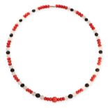 A CORAL, ROCK CRYSTAL AND AND ONYX BEAD NECKLACE comprising a single row of polished coral beads