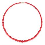 AN ANTIQUE CORAL BEAD NECKLACE in yellow gold, comprising a single row of eighty-three graduated