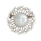 A MOONSTONE AND DIAMOND MAN IN THE MOON BROOCH in 18ct gold, set with a circular carved moonstone