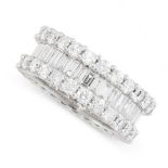 A DIAMOND ETERNITY RING the band set all around with a central row of baguette cut diamonds