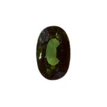 A 6.73 CARAT GREEN TOURMALINE oval mixed cut, illustrated unmounted.