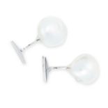 A PAIR OF BAROQUE SOUTH SEA PEARL CUFFLINKS each set with a pearl of 19.65mm and 18.51mm