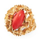 A VINTAGE CORAL RING in 18ct yellow gold, set with a marquise shaped cabochon, French Assay marks,