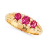 A RUBY AND DIAMOND DRESS RING in 18ct yellow gold, set with a trio of graduated cushion cut rubies