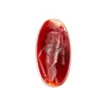 A 7.72 CARAT CARNELIAN INTAGLIO oval shaped, illustrated unmounted.