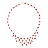 A GARNET FRINGE NECKLACE in 14ct yellow gold, set with oval cut garnets, stamped 585, 43.0cm, 10.1g.