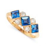 A SYNTHETIC SAPPHIRE AND DIAMOND DRESS RING in 18ct yellow gold, set with a trio of step cut