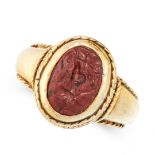 A ROMAN MAHOGANY OBSIDIAN INTAGLIO DRESS RING in yellow gold, set with a mahogany obsidian