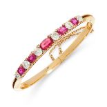 AN ANTIQUE BURMA NO HEAT RUBY AND DIAMOND BANGLE, LATE 19TH CENTURY in 18ct yellow gold, set with