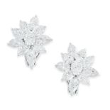 A PAIR OF DIAMOND EARRINGS set with a central oval cut diamond in a border of marquise cut diamonds,