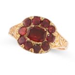 AN ANTIQUE GARNET CLUSTER RING, 19TH CENTURY in yellow gold, set with cushion and round cut garnets,