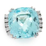 AN AQUAMARINE AND DIAMOND DRESS RING set with a cushion cut aquamarine of 27.76 carats, between rows