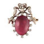 AN ANTIQUE GARNET AND DIAMOND SWEETHEART BROOCH in yellow gold and silver, set with a central oval