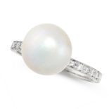 A PEARL AND DIAMOND RING set with a pearl of 11.2mm, accented by round cut diamonds in the band,