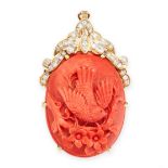 A CORAL AND DIAMOND PENDANT / BROOCH in 14ct yellow gold, the body set with a large oval piece of