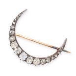 ANTIQUE VICTORIAN DIAMOND BROOCH, LATE 19TH CENTURY of crescent moon design, mounted in silver on