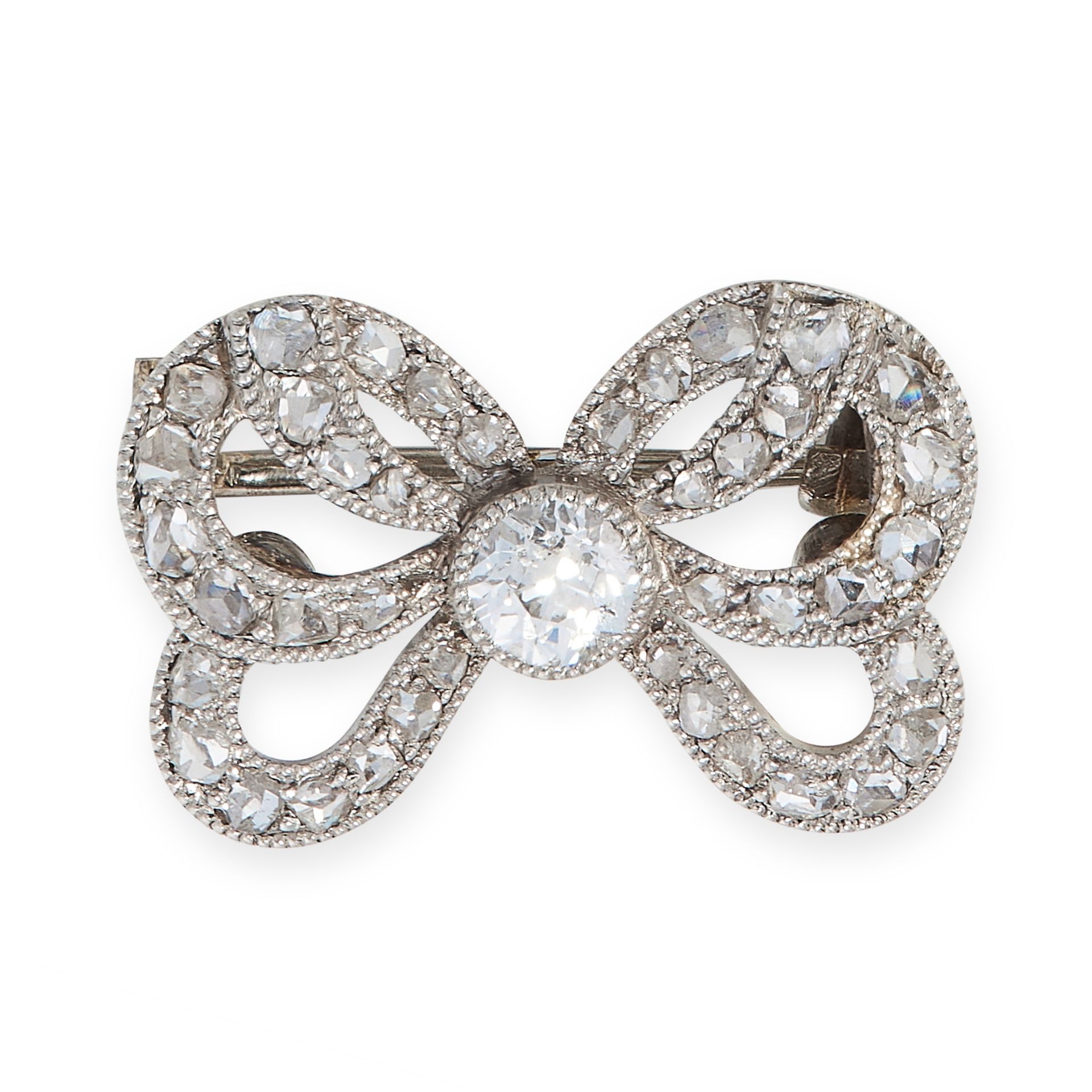 ANTIQUE DIAMOND BROOCH, EARLY 20TH CENTURY designed as a bow, millegrain-set with a circular-cut