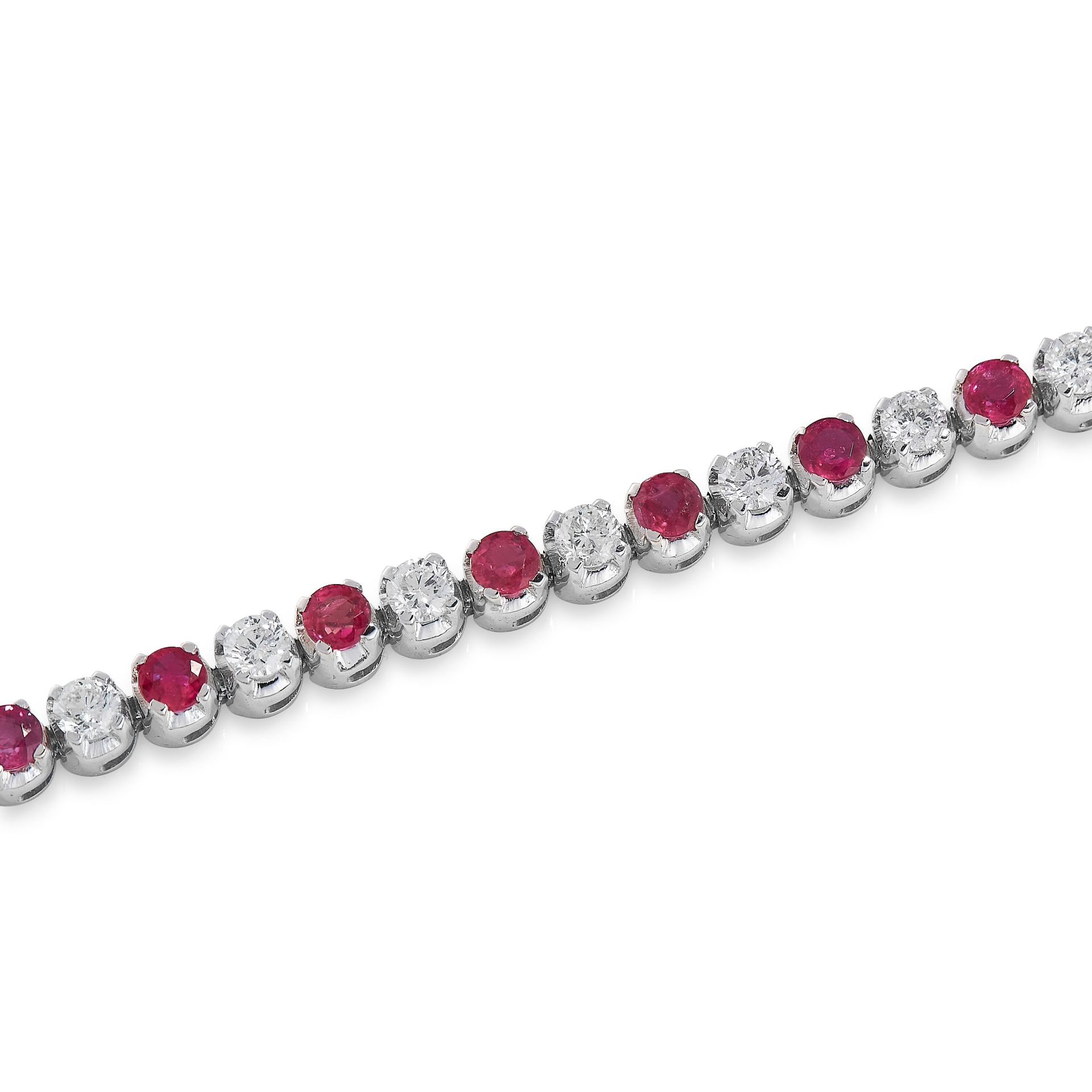 RUBY AND DIAMOND BRACELET designed as an articulated line of claw-set brilliant-cut diamonds and - Image 2 of 2