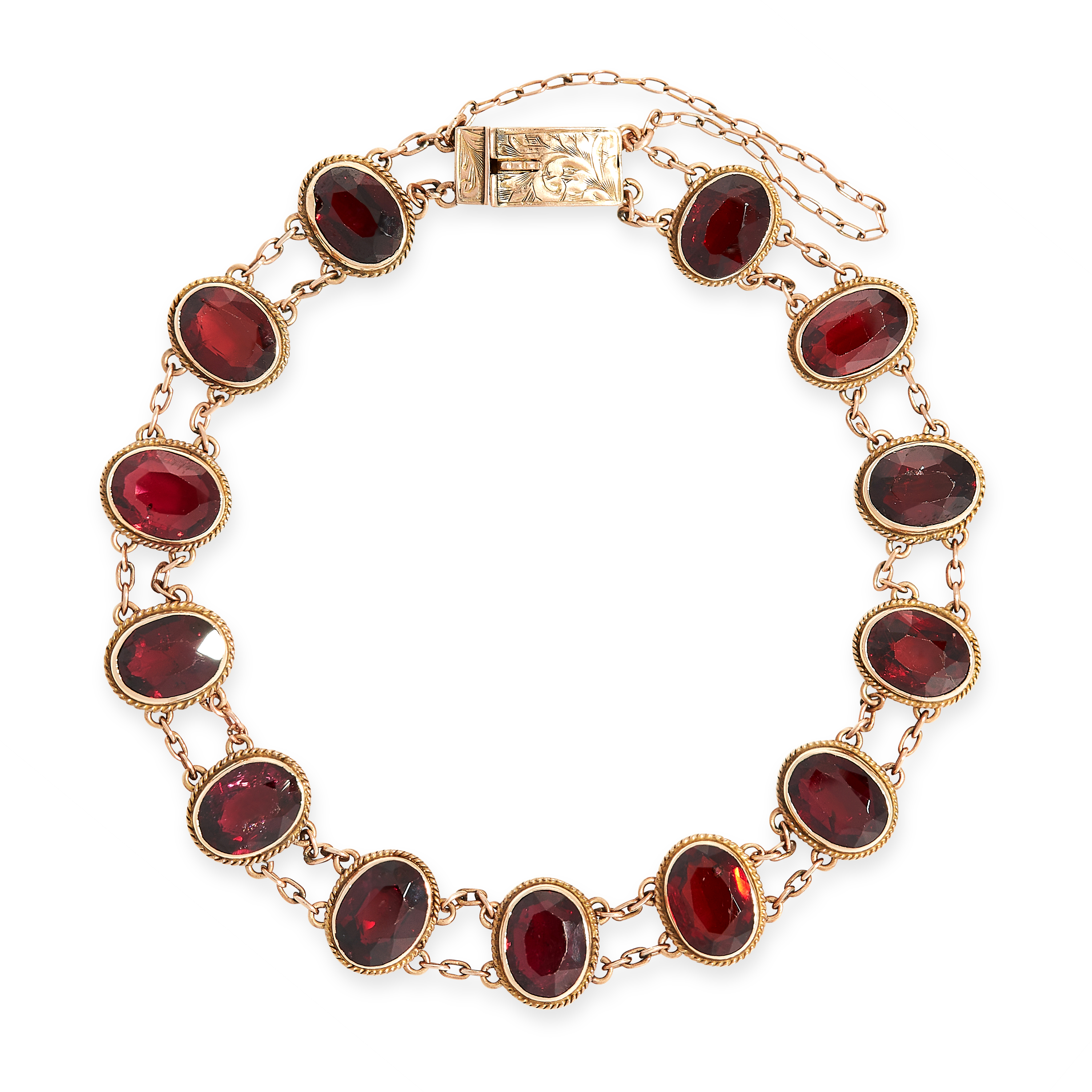 ANTIQUE GARNET BRACELET mounted in yellow gold, formed of a series of thirteen oval cut garnets in